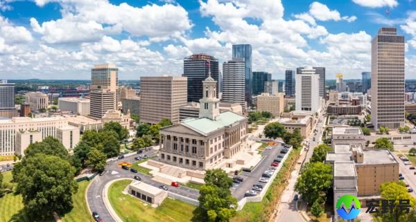 Aerial view of Nashville Capitol and skyline on a sunny day. Nashville is the capital and most populous city of Tennessee, and a major center for the music industry