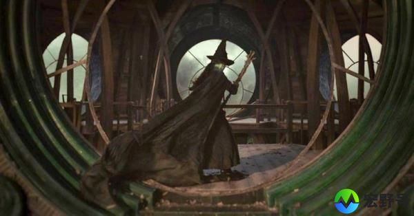 Cynthia Erivo with signature witch hat and broom 