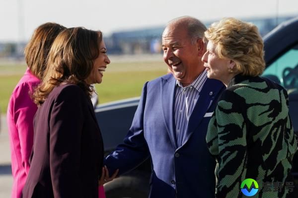Vice President Harris getting greeted by Michigan Teamsters President Kevin Moore after arriving in Detroit on Sept. 19, 2024.