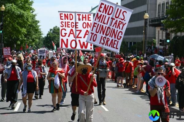 Pro-Palestinian demo<em></em>nstrators march on 17th Street NW near the White House in Washington, DC, on June 8, 2024 to protest against Israel