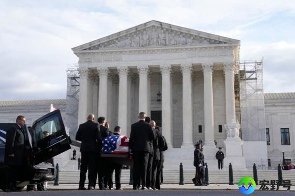 The flag-draped casket of retired Supreme Court Justice Sandra Day O