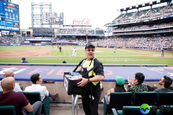 50 year veteran Bobby Lee serving Beer at Citi Field during a Mets home game against the Los Angeles Dodgers.