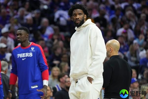 Joel Embiid #21 of the Philadelphia 76ers looks on during a timeout against the Milwaukee Bucks in the first half at the Wells Fargo Center on October 23, 2024 in Philadelphia, Pennsylvania.