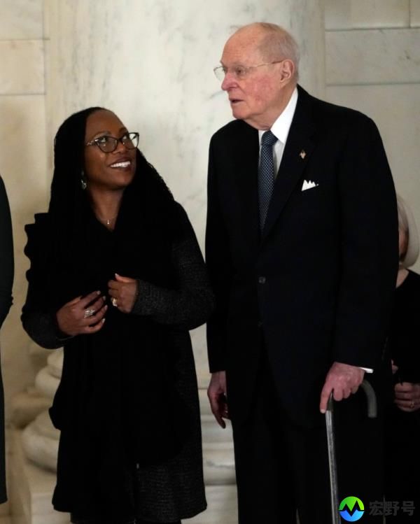 Supreme Court Justice Ketanji Brown Jackson talks with retired Justice Anthony Kennedy before the ceremony.