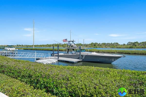 The home recently renovated a dock to hold a boat that is up to 70 foot-long.