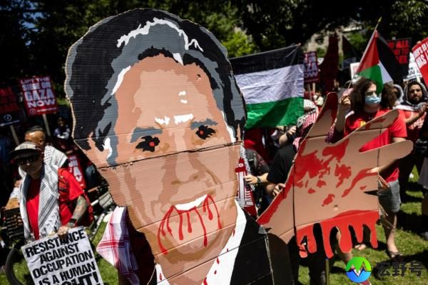 Pro-Palestinian activists hold up a effigy of U.S. Secretary of State Antony Bl<em></em>inken during a demo<em></em>nstration in Lafayette Park in front of the White House to protest the war in Gaza on June 8, 2024 in Washington, DC.