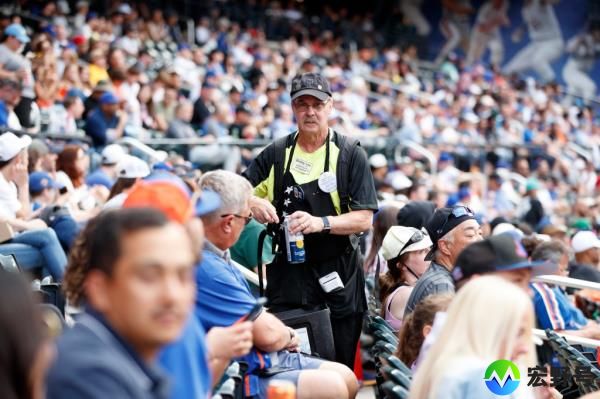 50 year veteran Bobby Lee serving Beer at Citi Field during a Mets home game against the Los Angeles Dodgers.