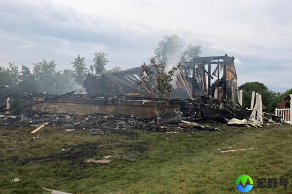 The ruins of a home that was destroyed in an explosion stands at the intersection of Rustic Ridge and Brookside drives in Plum, Pa., on Saturday, Aug. 12, 2023. 