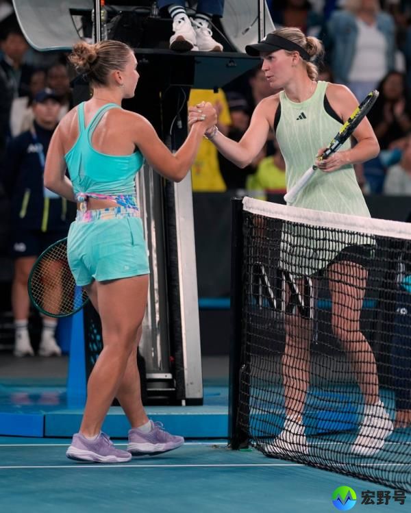 Caroline Wozniacki, right, of Denmark co<em></em>ngratulates Maria Timofeeva of Russia following their second round match at the Australian Open tennis champio<em></em>nships at Melbourne Park