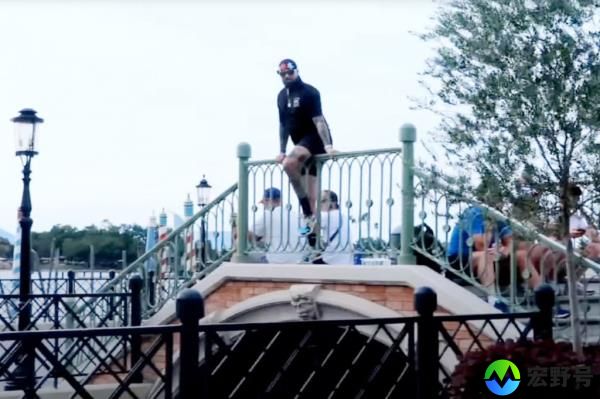 An unnamed man was recorded climbing over a bridge at Disney World