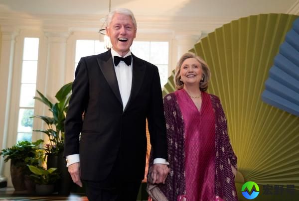 Former President Bill Clinton and former Secretary of State Hillary Clinton arriving at the dinner.