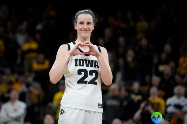 Iowa guard Caitlin Clark makes a heart gesture after the team