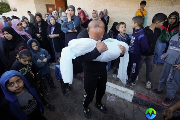Palestinians mourn the death of a relative killed by an Israeli airstrike on Sunday. 