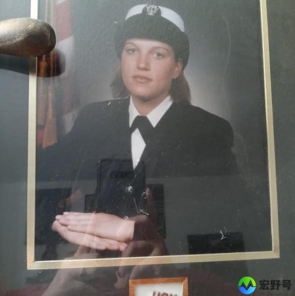 Sabean is pictured in her Navy uniform.