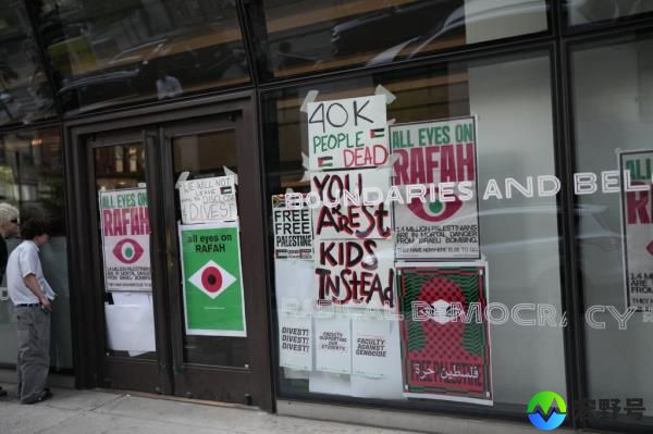 Pro-Palestine protestors gather outside the New School as faculty members built an encampment inside the school on May 8, 2024 in New York, 