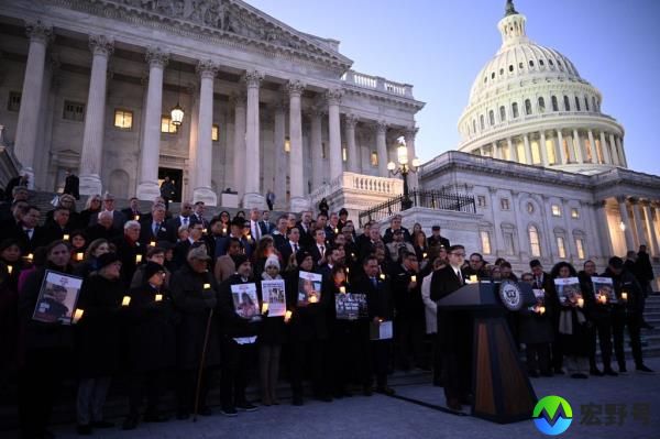 US House Speaker Mike Johnson speaks as he leads a candlelight vigil with families of hostages held by Hamas in the Gaza Strip and other lawmakers to commemorate 100 days of the Hamas attack on Israel, outside the US Capitol in Washington, DC, on January 17, 2024.