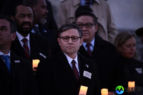 US House Speaker Mike Johnson leads a candlelight vigil with hostage families to commemorate 100 days of the Hamas attack on Israel, outside the US Capitol in Washington, DC, on January 17, 2024.