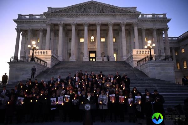 People attend a candlelight vigil with families of hostages held by Hamas in the Gaza Strip and lawmakers to commemorate 100 days of the Hamas attack on Israel, outside the US Capitol in Washington, DC, on January 17, 2024.