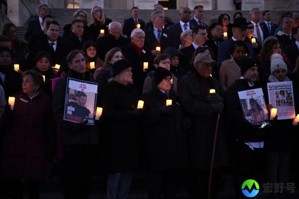 People attend a candlelight vigil with families of hostages held by Hamas in the Gaza Strip and lawmakers to commemorate 100 days of the Hamas attack on Israel, outside the US Capitol in Washington, DC, on January 17, 2024.