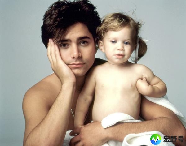 John Stamos and one of the Olsen twins during season 2 of 
