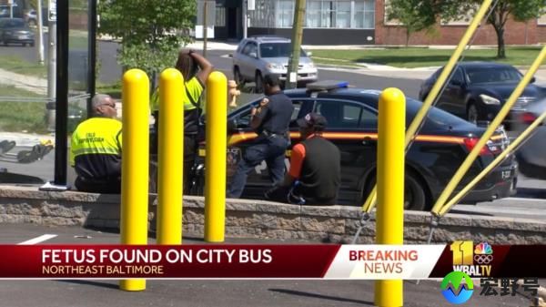 Police officers co<em></em>nducting an investigation on an MTA bus