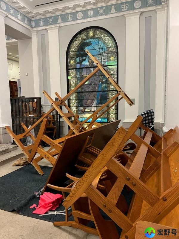 Tables and chairs piled up in Hamilton Hall